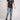 Hollywood Trading Company LOOSE MUSH BLUE LOOSE MUSH BLUE Loose fit jeans in blue denim, 5 pockets, hidden front button closure. Metallic logo detail on the back. 100% cotton. Made in Italy. Hollywood Trading Company Hollywood Trading Company