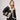 Hollywood Trading Company LOU SHEARLING LOU SHEARLING Black leather jacket. Lining, contour and lapels in white shearling. Frontal buttons. Wrist bands with buttons. 2 side pockets. 100% sheepskin. Made in Italy. Hollywood Trading Company Hollywood Tradin