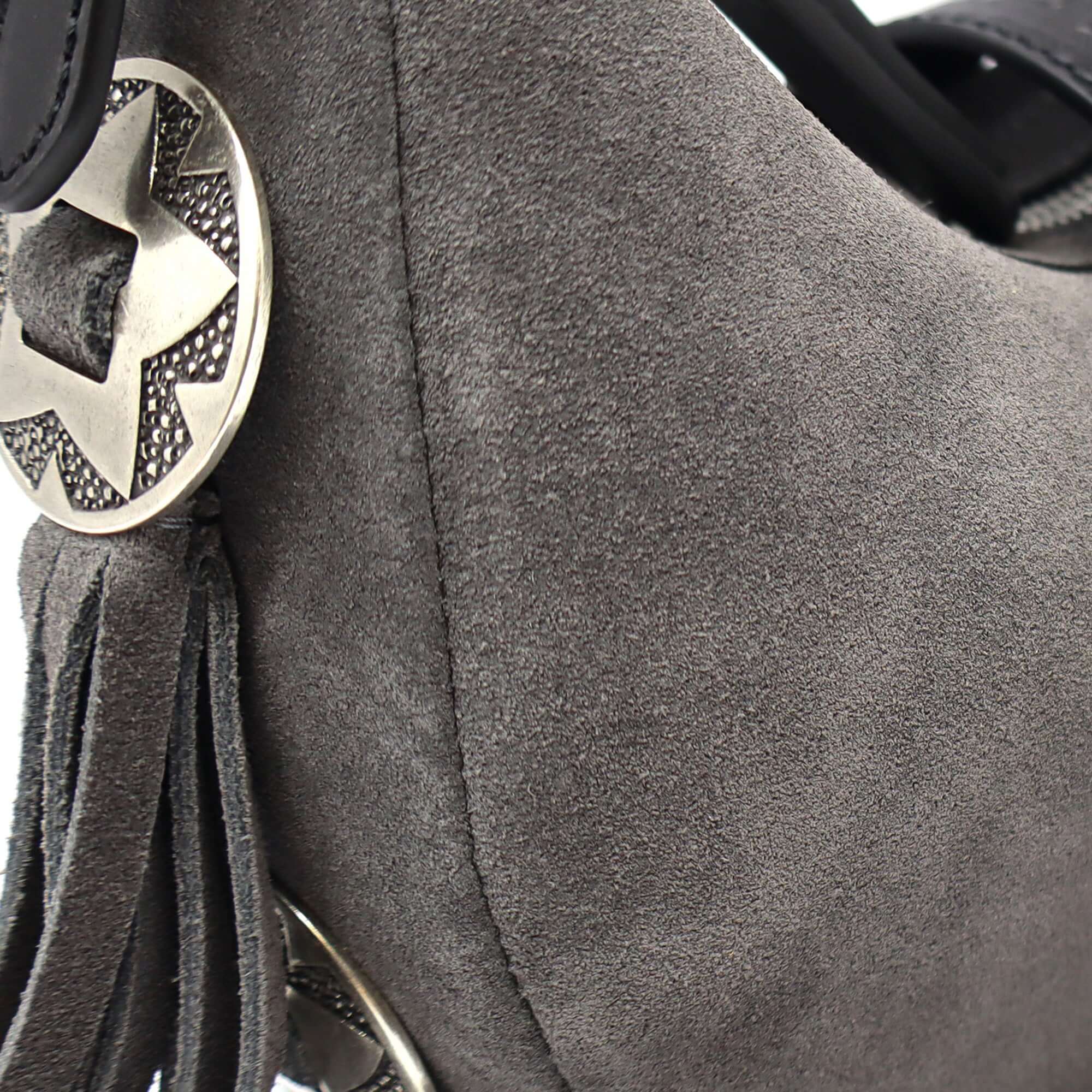 htc los angeles SHERYL SUEDE CONCHOS Moon bag in Anthracite, featuring a zip closure, fringes and concho-details. Crafted in Italy, 100% cow leather. Hollywood Trading Company
