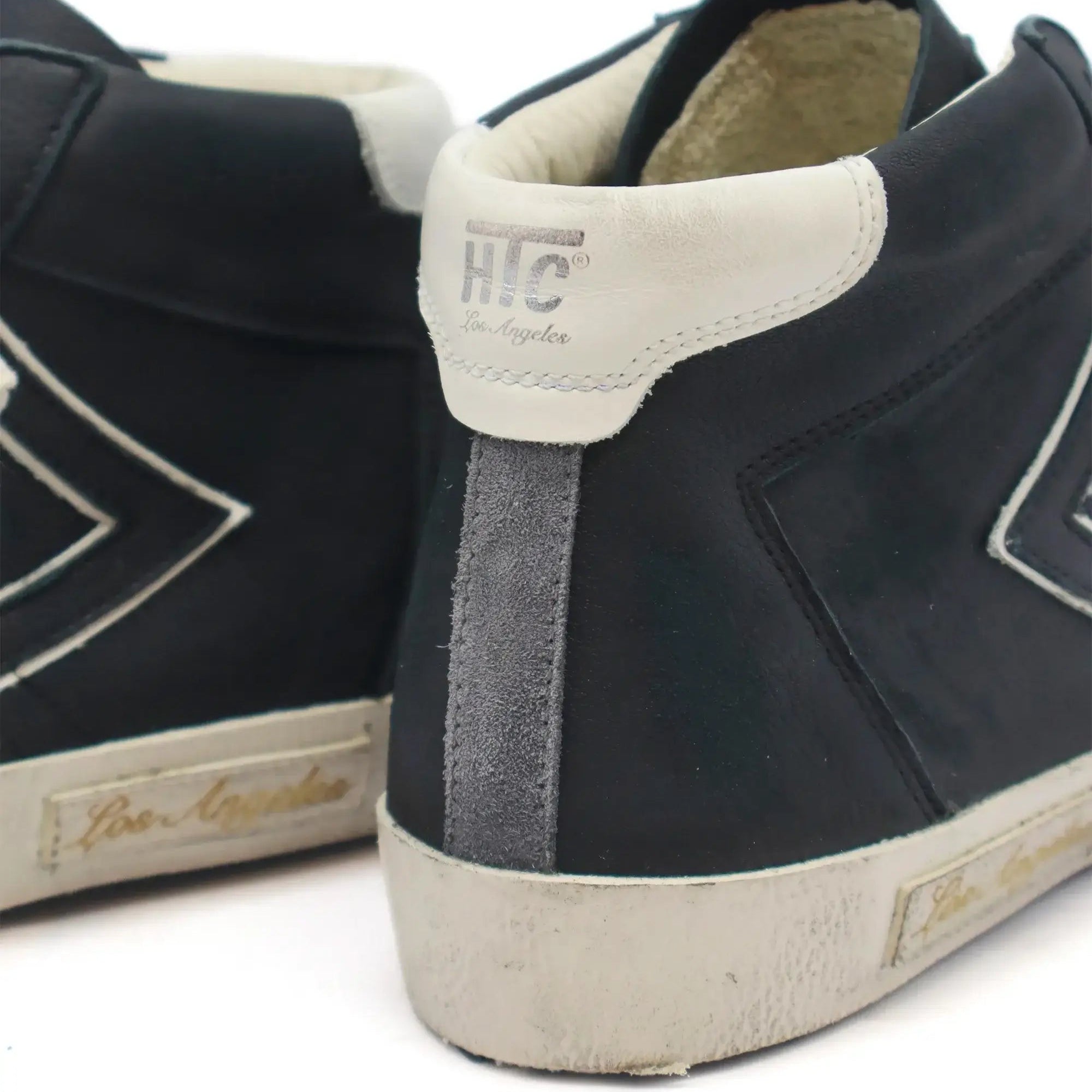 htc los angeles HTC VIPERS HIGH MAN BLACK HTC VIPERS HIGH MAN BLACK HTC VIPERS high-top sneakers in white with a distressed finish. Standard fit providing a comfortable and flexible wrap. Front lace-up closure for a secure fit. Small logo on the tongue an