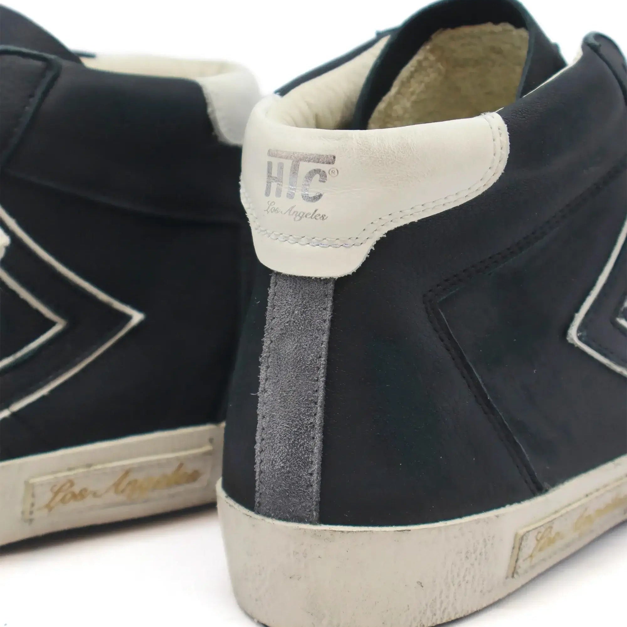 htc los angeles HTC VIPERS HIGH WOMAN BLACK HTC VIPERS HIGH WOMAN BLK BLACK HTC VIPERS high-top sneakers in black with a distressed finish. Standard fit providing a comfortable and flexible wrap. Front lace-up closure for a secure fit. Small logo on the t
