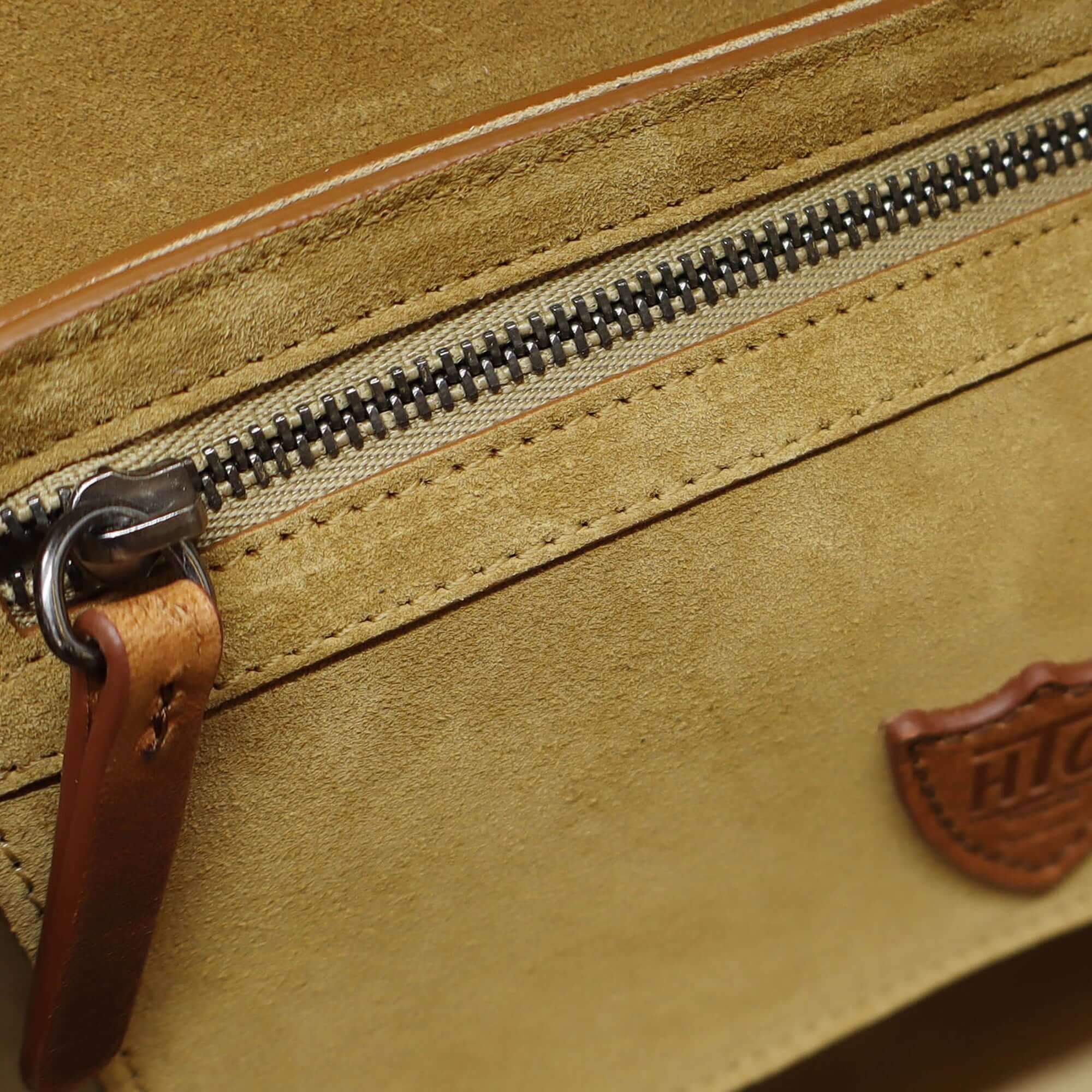 htc los angeles JOAN SUEDE FLOWERS Saddle bag in Camel, featuring flower-studded details. Crafted in Italy, 100% cow leather. Hollywood Trading Company