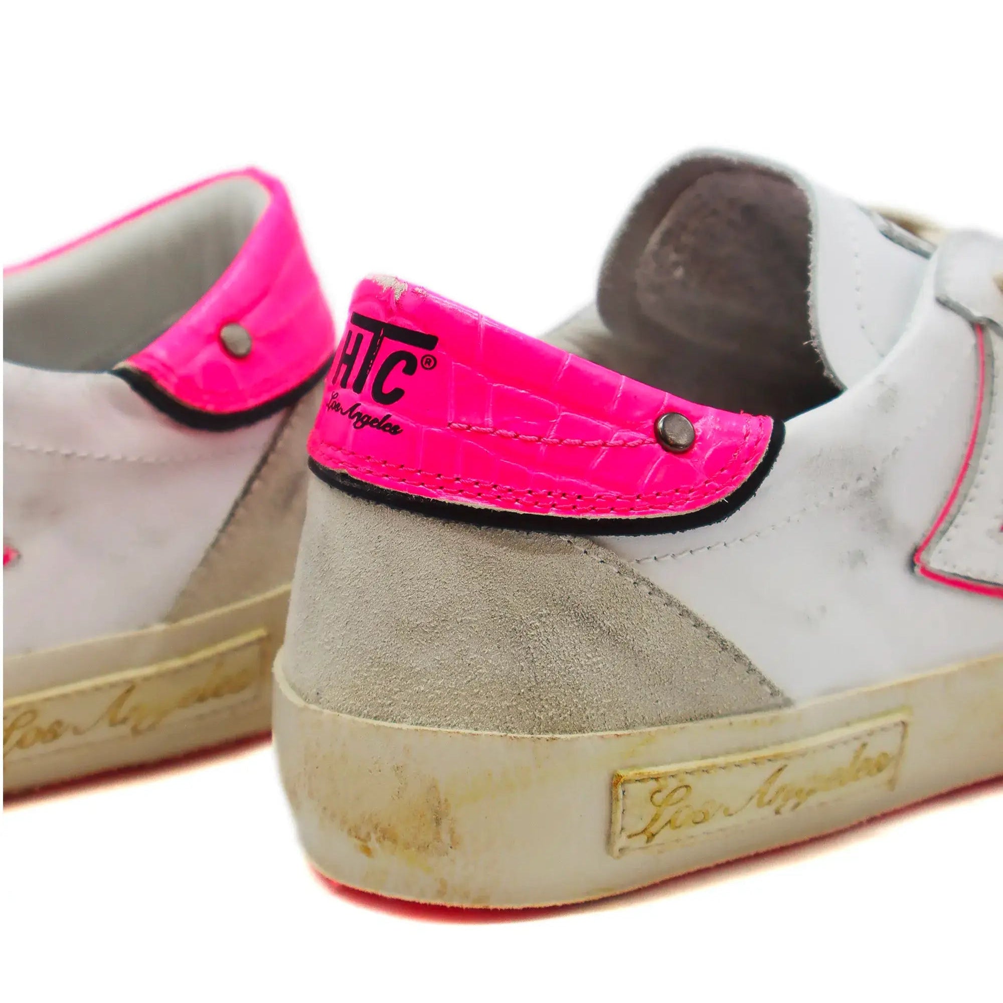 htc los angeles HTC VIPERS LOW WOMAN W/P HTC VIPERS LOW WOMAN W/P HTC VIPERS low-top sneakers in white/pink with a distressed finish. Standard fit, providing a comfortable and flexible wrap. Front lace-up closure for a secure fit. Small logo on the tongue