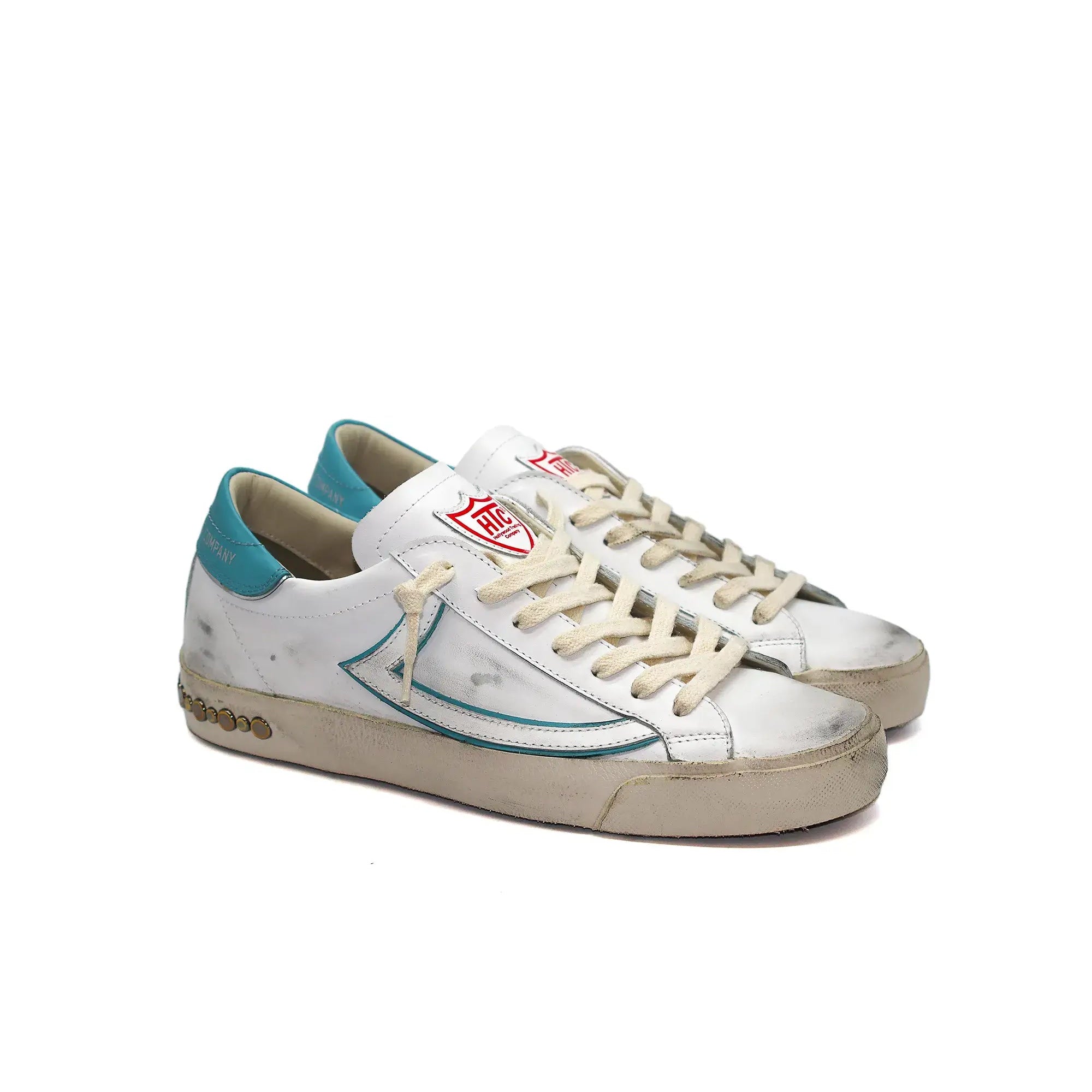 htc los angeles HTC VIPERS LOW MAN WHITE/AZURE HTC VIPERS LOW MAN W/A HTC VIPERS low-top sneakers in white/azure with a distressed finish. Standard fit, providing a comfortable and flexible wrap. Front lace-up closure for a secure fit. Small logo on the t