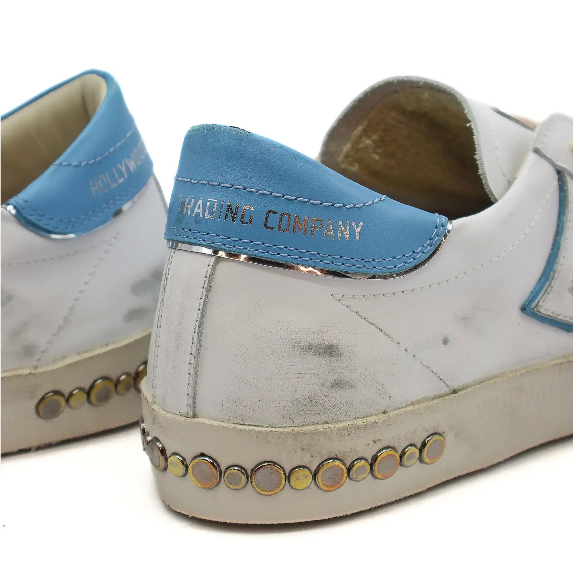 htc los angeles HTC VIPERS LOW MAN WHITE/AZURE HTC VIPERS LOW MAN W/A HTC VIPERS low-top sneakers in white/azure with a distressed finish. Standard fit, providing a comfortable and flexible wrap. Front lace-up closure for a secure fit. Small logo on the t