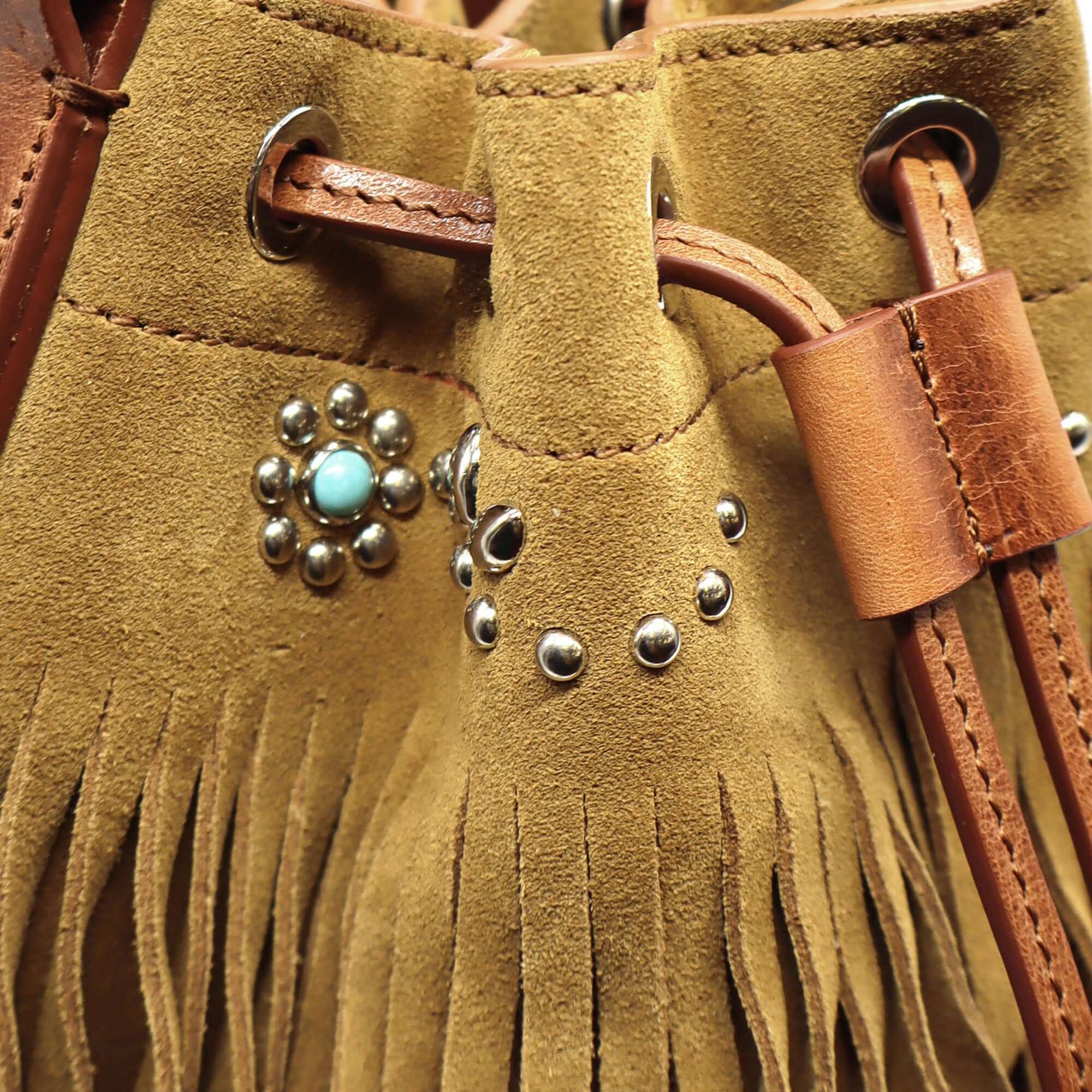 htc los angeles JANIS FRINGES Bucket bag in Camel suede, featuring flowers studded details. Crafted in Italy, 100% cow leather. Hollywood Trading Company