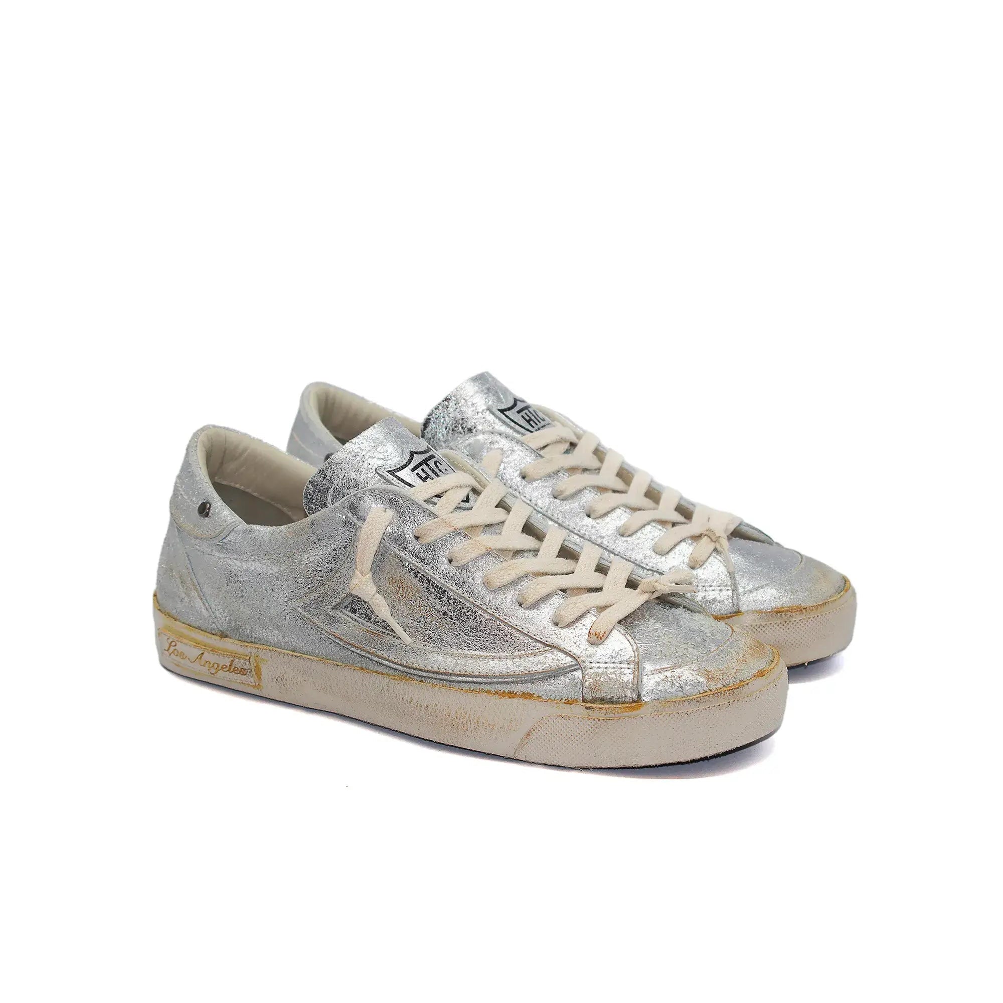 htc los angeles HTC VIPERS LOW MAN SILVER HTC VIPERS LOW MAN SILVER HTC VIPERS low-top sneakers in silver with a distressed finish. Standard fit, providing a comfortable and flexible wrap. Front lace-up closure for a secure fit. Small logo on the tongue a
