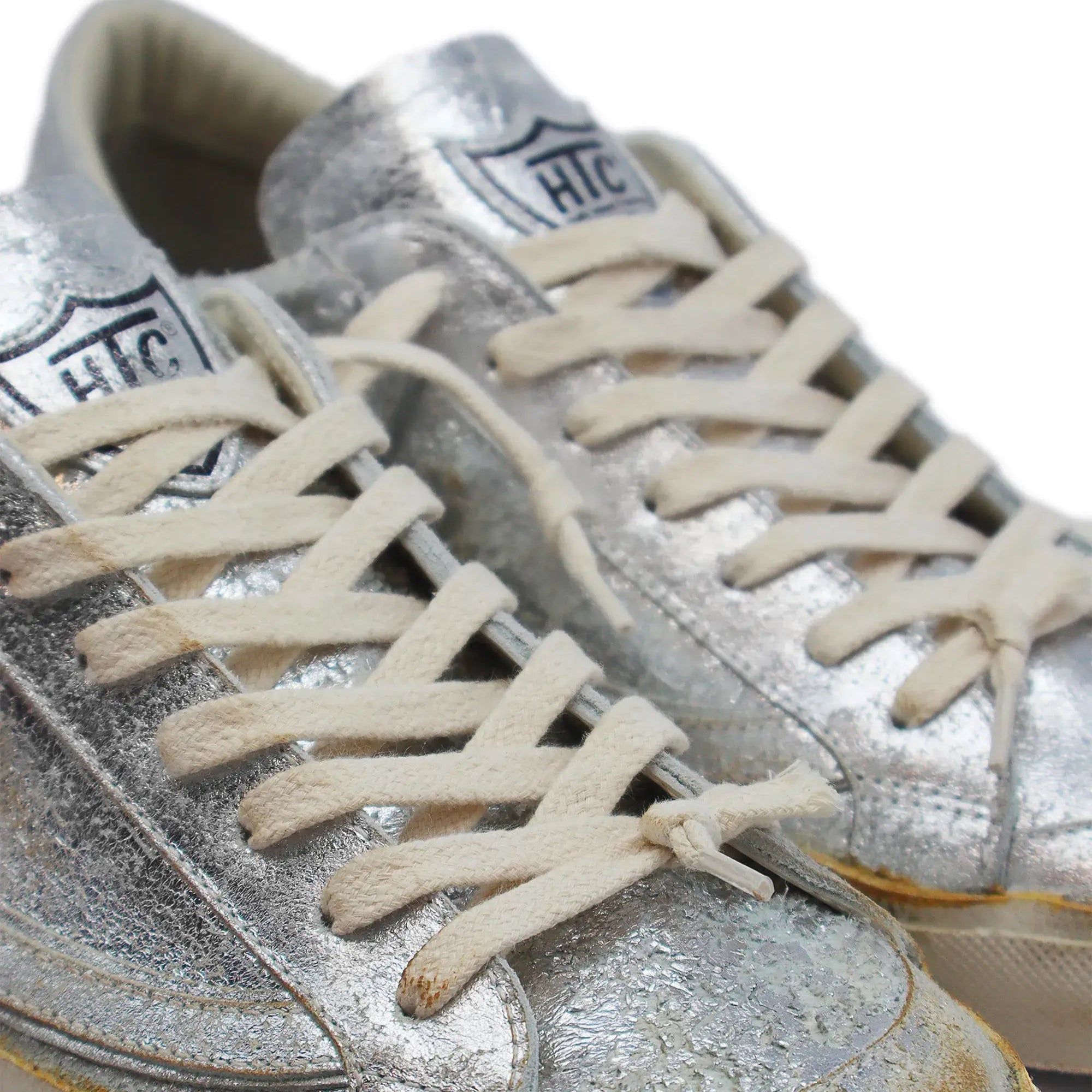 htc los angeles HTC VIPERS LOW WOMAN SILVER HTC VIPERS LOW WOMAN SILVER SILVER HTC VIPERS low-top sneakers in silver with a distressed finish. Standard fit, providing a comfortable and flexible wrap. Front lace-up closure for a secure fit. Small logo on t