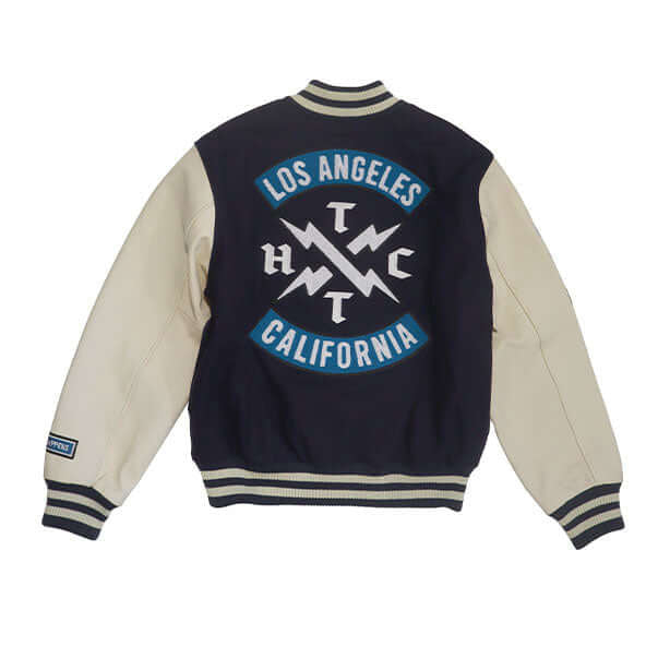HTC LOS ANGELES HTC VARSITY JACKET NAVY HTC VARSITY JACKET NAVY Limited edition for Seoul. Varsity wool & leather bomber jacket. Front button closure, ribbed collar, cuffs and hem. Embroidered details and patches. Two side pockets. Main body composition: