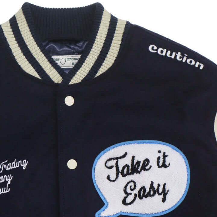 HTC LOS ANGELES HTC VARSITY JACKET NAVY HTC VARSITY JACKET NAVY Limited edition for Seoul. Varsity wool & leather bomber jacket. Front button closure, ribbed collar, cuffs and hem. Embroidered details and patches. Two side pockets. Main body composition: