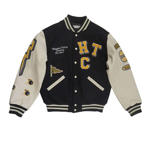 HTC LOS ANGELES HTC VARSITY JACKET BLACK HTC VARSITY JACKET BLACK Limited edition for Seoul. Varsity wool & leather bomber jacket. Front button closure, ribbed collar, cuffs and hem. Embroidered details and patches. Two side pockets. Main body composition