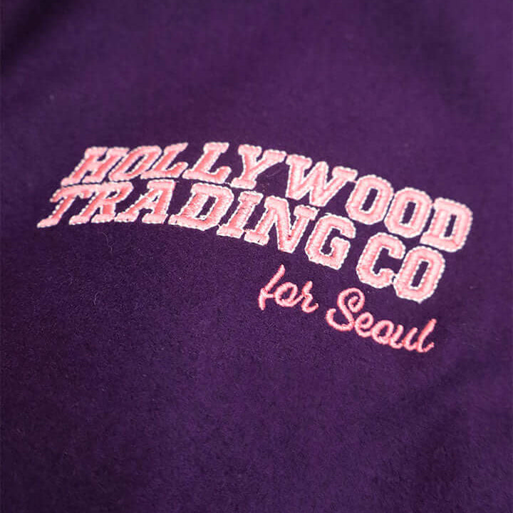 HTC LOS ANGELES HTC VARSITY JACKET PURPLE HTC VARSITY JACKET PURPLE Limited edition for Seoul. Varsity wool & leather bomber jacket. Front button closure, ribbed collar, cuffs and hem. Embroidered details and patches. Two side pockets. Main body compositi