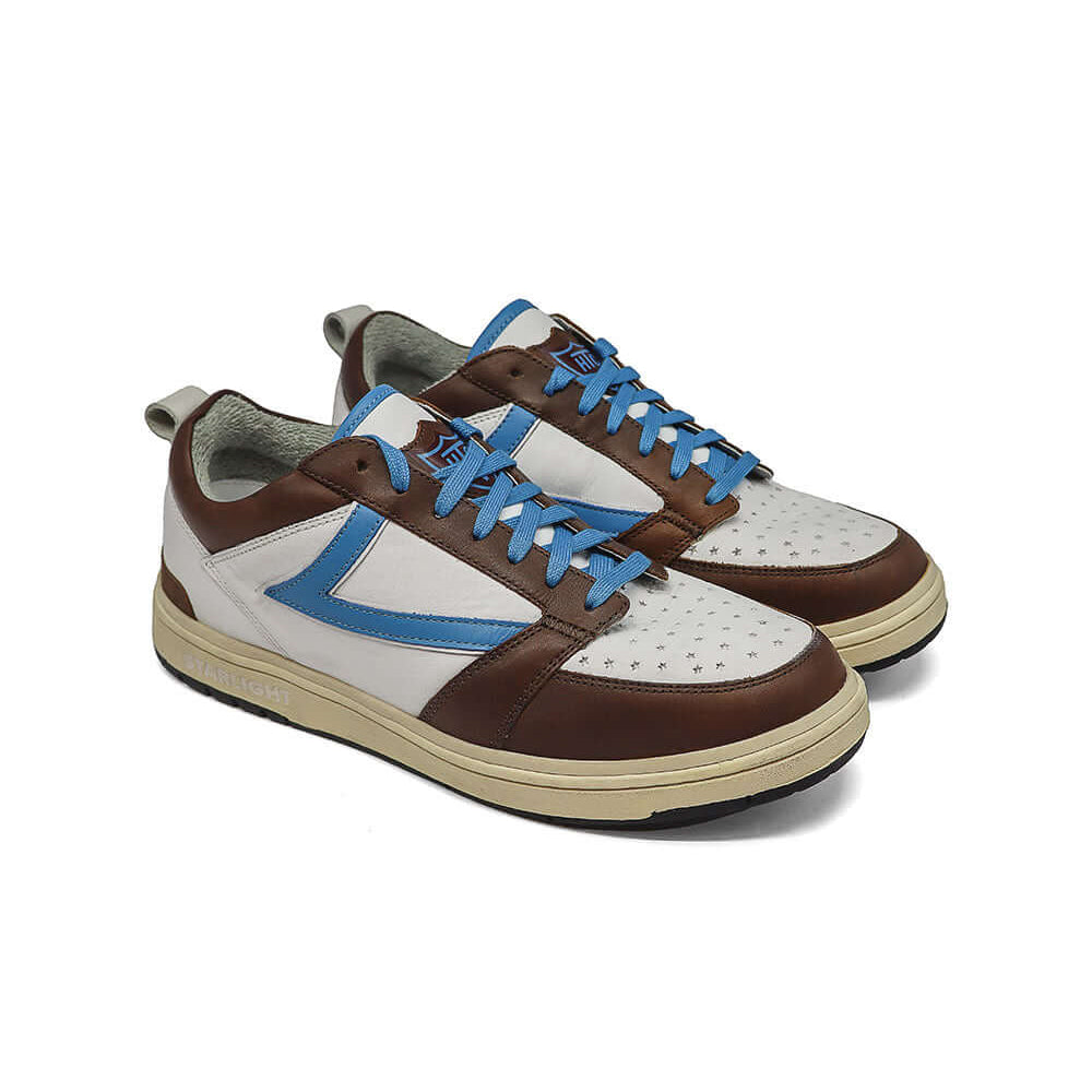 Hollywood Trading Company STARLIGHT COLOR SHIELD LOW MAN BROWN/BLUE STARLIGHT COLOR SHIELD LOW MAN BROWN/BLUE HTC Starlight Color Low Man sneakers, back pull loop with metal logo detail, front lace-up closure SHOES Hollywood Trading Company Hollywood Trad