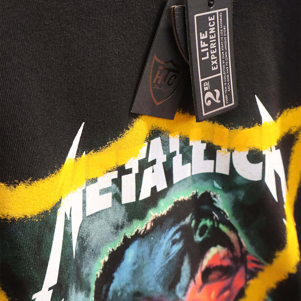 Hollywood Trading Company HTC VINTAGE METALLICA T-SHIRT HTC VINTAGE METALLICA T-SHIRT ONE OF A KIND VINTAGE T-SHIRT WITH ORIGINAL METALLICA PRINT, REWORKED WITH YELLOW HTC LOGO ON THE FRONT. REGULAR FIT. t-shirt Hollywood Trading Company Hollywood Trading