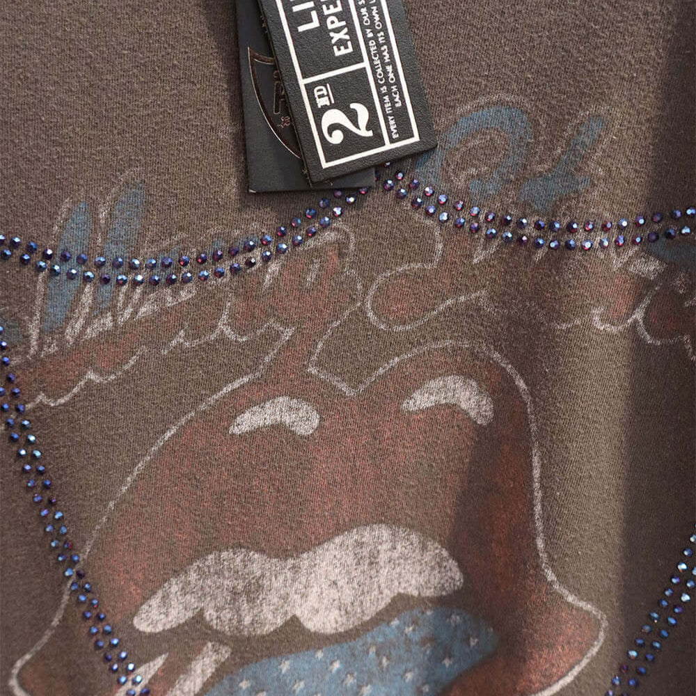Hollywood Trading Company HTC VINTAGE ROLLING STONES LUX T-SHIRT HTC VINTAGE ROLLING STONES LUX T-SHIRT ONE OF A KIND VINTAGE T-SHIRT WITH ORIGINAL ROLLING STONES PRINT, REWORKED WITH BLUE STUDDED HTC LOGO ON THE FRONT. REGULAR FIT. t-shirt Hollywood Trad