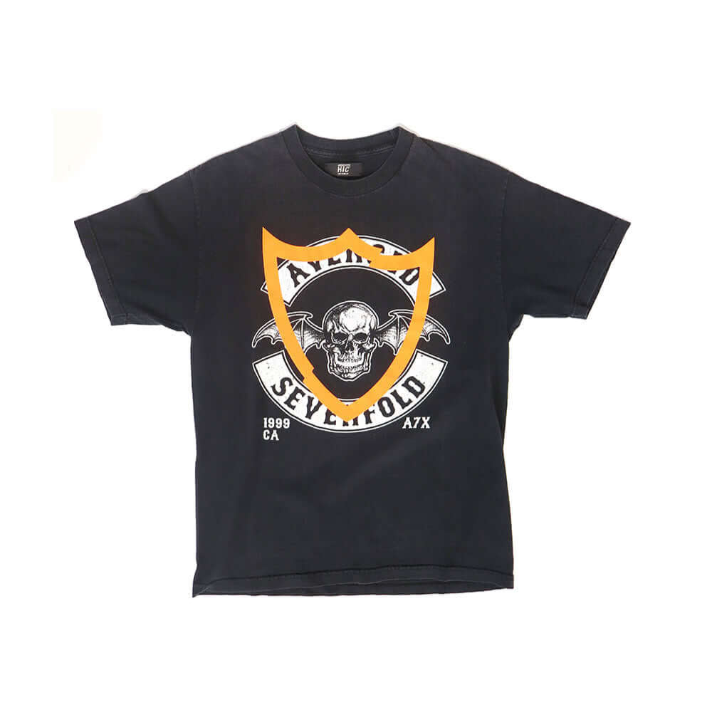 Hollywood Trading Company HTC VINTAGE AVENGED SEVENFOLD T-SHIRT HTC VINTAGE AVENGED SEVENFOLD T-SHIRT ONE OF A KIND VINTAGE T-SHIRT WITH ORIGINAL AVENGED SEVENFOLD PRINT, REWORKED WITH ORANGE HTC LOGO ON THE FRONT. REGULAR FIT. t-shirt Hollywood Trading C