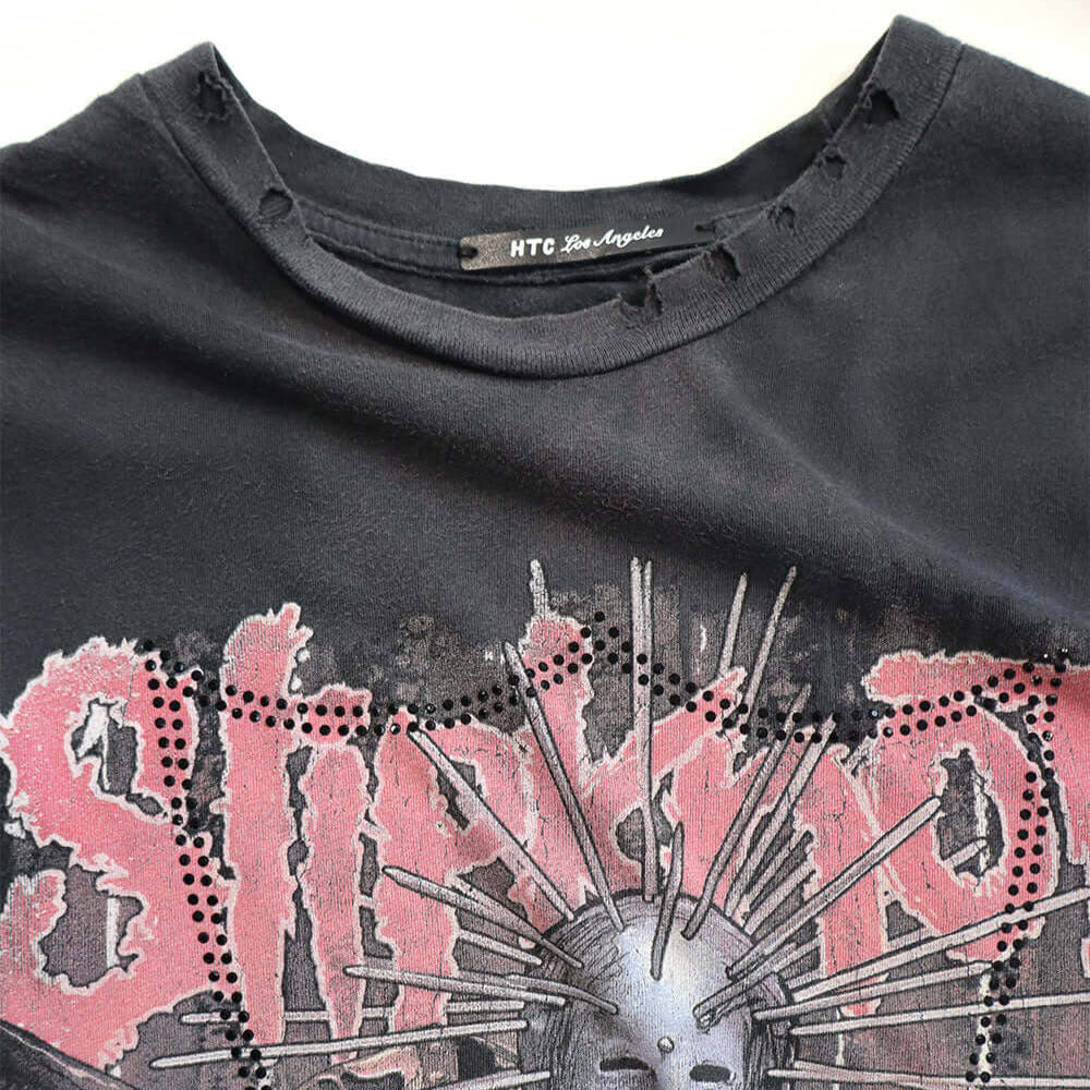 Hollywood Trading Company HTC VINTAGE SLIPKNOT LUX T-SHIRT HTC VINTAGE SLIPKNOT LUX T-SHIRT ONE OF A KIND VINTAGE T-SHIRT WITH ORIGINAL SLIPKNOT PRINT, REWORKED WITH BLACK STUDDED HTC LOGO ON THE FRONT. REGULAR FIT. t-shirt Hollywood Trading Company Holly
