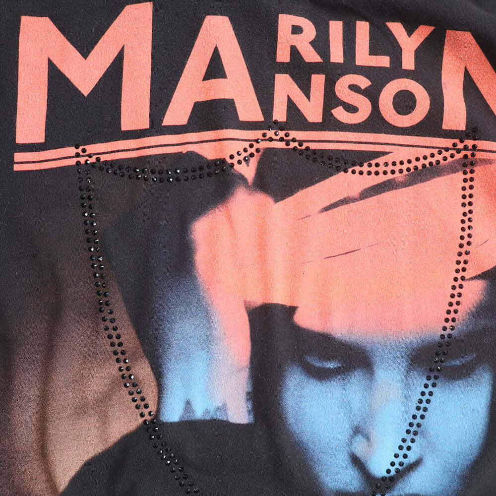Hollywood Trading Company HTC VINTAGE MARILYN MANSON LUX T-SHIRT HTC VINTAGE MARILYN MANSON LUX T-SHIRT ONE OF A KIND VINTAGE T-SHIRT WITH ORIGINAL MARILYN MANSON PRINT, REWORKED WITH BLACK STUDDED HTC LOGO ON THE FRONT. SLIM FIT. t-shirt Hollywood Tradin