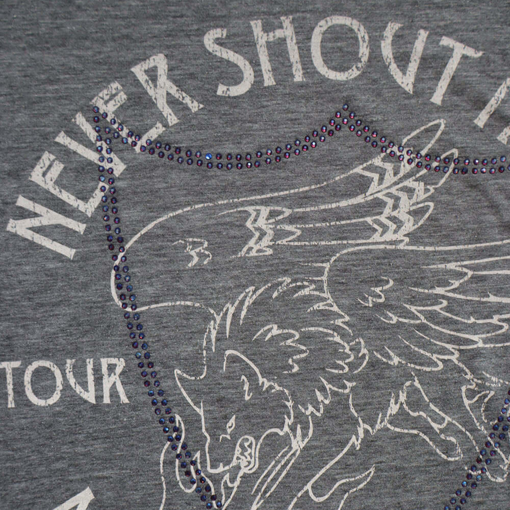 Hollywood Trading Company HTC VINTAGE NEVER SHOUT NEVER LUX T-SHIRT GREY/WHITE HTC VINTAGE NEVER SHOUT NEVER LUX T-SHIRT GREY/WHITE ONE OF A KIND VINTAGE T-SHIRT WITH ORIGINAL NEVER SHOUT NEVER PRINT, REWORKED WITH BLUE STUDDED HTC LOGO ON THE FRONT. REGU