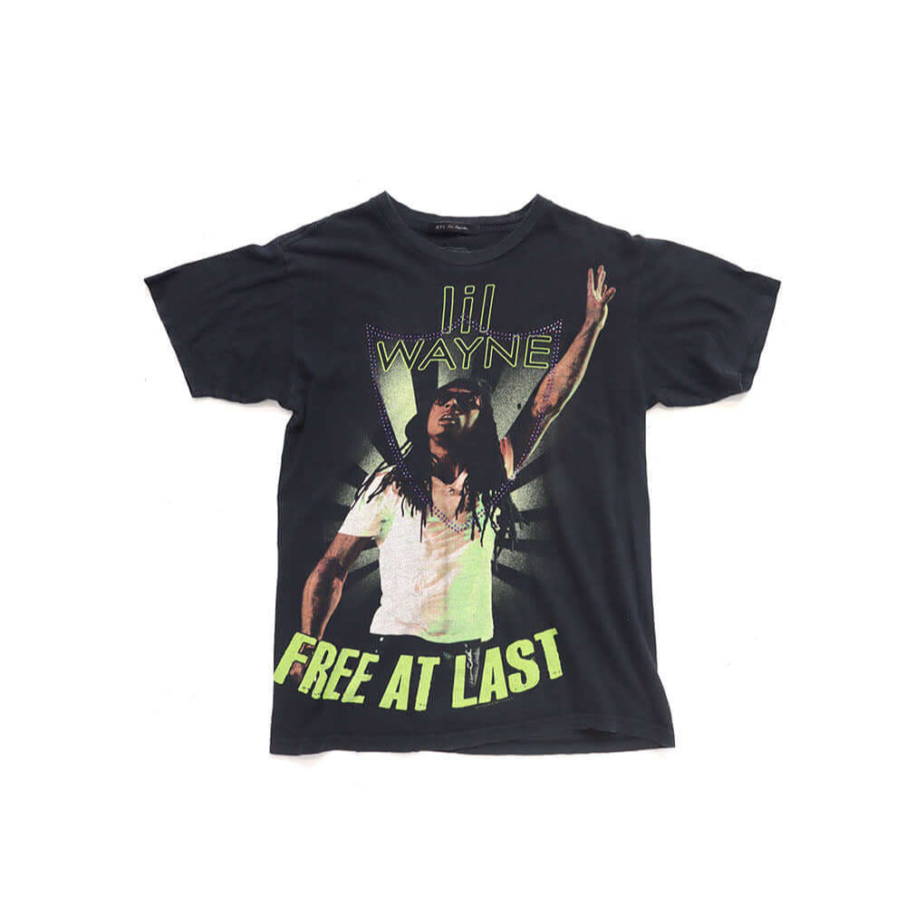 Hollywood Trading Company HTC VINTAGE LIL WAYNE LUX T-SHIRT BLACK/GREEN HTC VINTAGE LIL WAYNE LUX T-SHIRT BLACK/GREEN ONE OF A KIND VINTAGE T-SHIRT WITH ORIGINAL LIL WAYNE PRINT, REWORKED WITH BLUE STUDDED HTC LOGO ON THE FRONT. REGULAR FIT. T-SHIRTS Holl