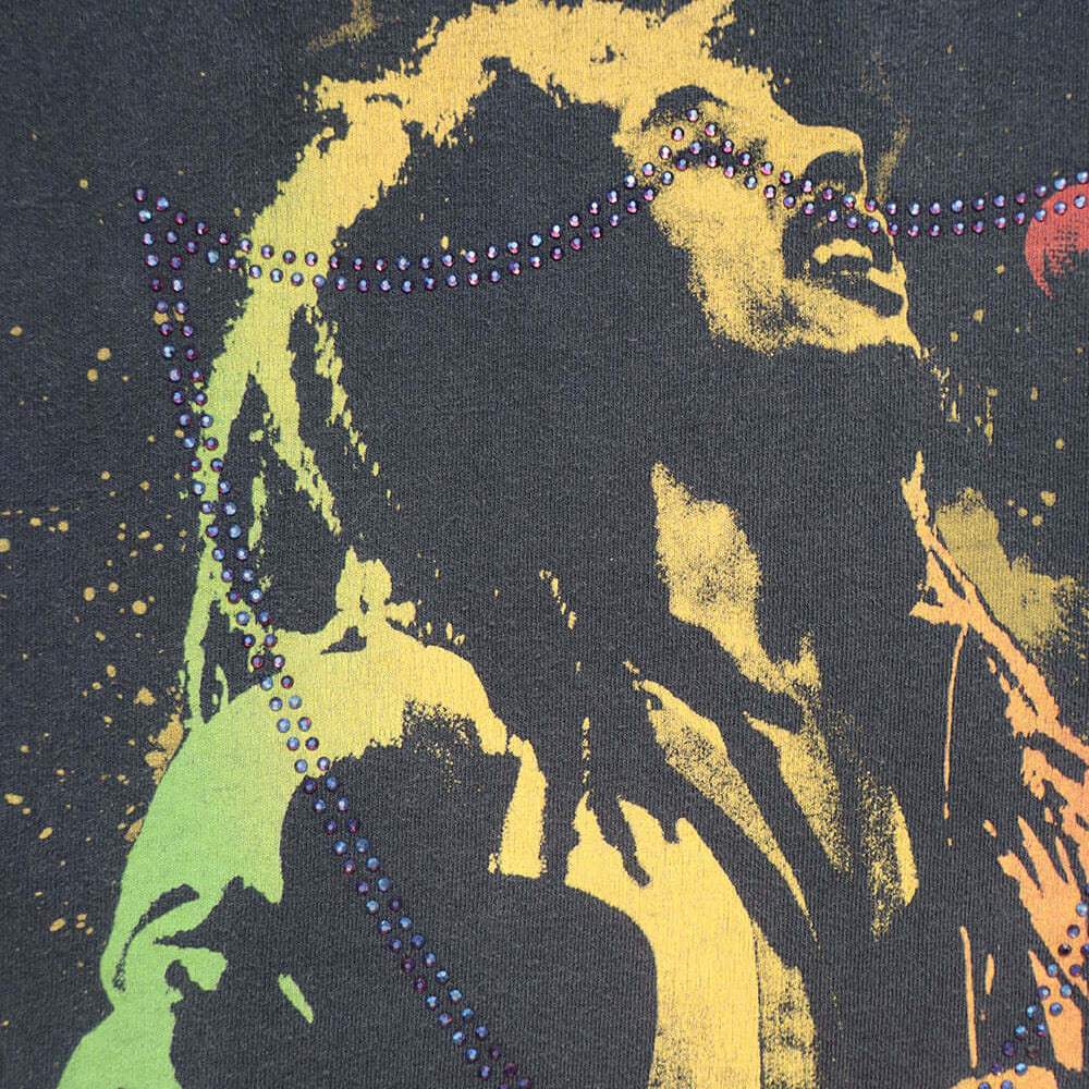 Hollywood Trading Company HTC VINTAGE BOB MARLEY LUX T-SHIRT MIX BLACK HTC VINTAGE BOB MARLEY LUX T-SHIRT MIX BLACK ONE OF A KIND VINTAGE T-SHIRT WITH ORIGINAL BOB MARLEY PRINT, REWORKED WITH BLUE STUDDED HTC LOGO ON THE FRONT. BOXY FIT. T-SHIRTS Hollywoo
