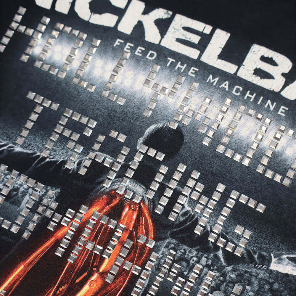 Hollywood Trading Company HTC VINTAGE NICKELBACK LUX T-SHIRT MIX BLACK HTC VINTAGE NICKELBACK LUX T-SHIRT MIX BLACK ONE OF A KIND VINTAGE T-SHIRT WITH ORIGINAL NICKELBACK PRINT, REWORKED WITH SILVER STUDDED HTC LOGO ON THE T-SHIRTS Hollywood Trading Compa