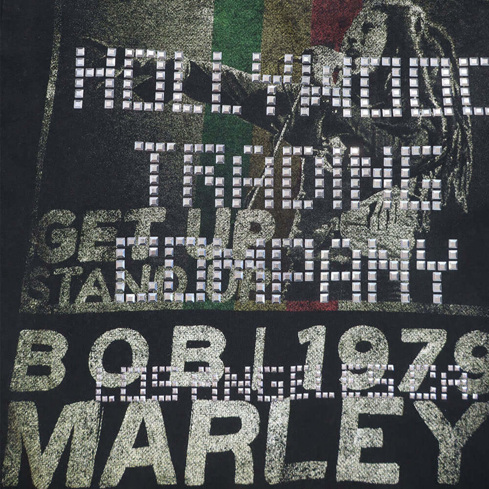 htc los angeles HTC VINTAGE BOB MARLEY STUDDED T-SHIRT MIX BLACK HTC VINTAGE BOB MARLEY STUDDED T-SHIRT MIX BLACK ONE OF A KIND VINTAGE T-SHIRT WITH ORIGINAL BOB MARLEY PRINT, REWORKED WITH SILVER STUDDED HTC LOGO ON THE FRONT. REGULAR FIT. T-SHIRTS Holly