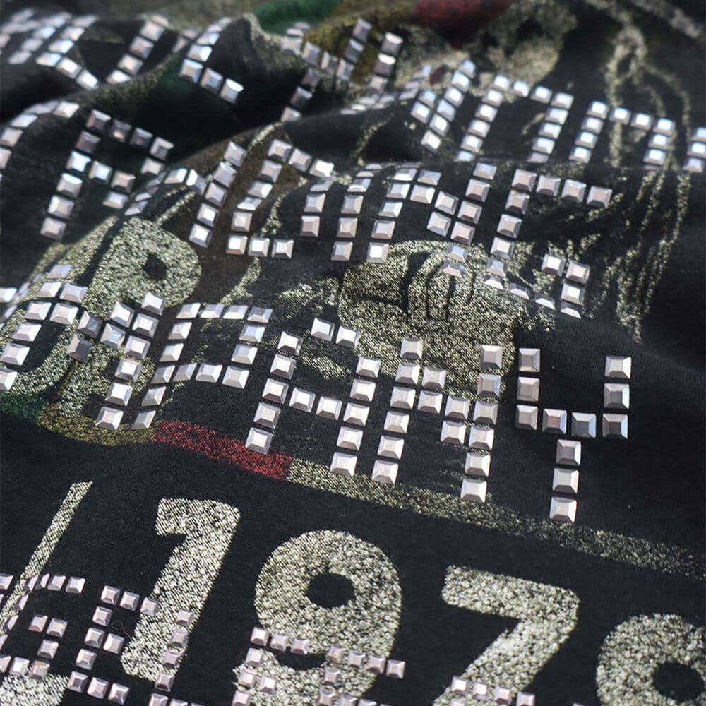 htc los angeles HTC VINTAGE BOB MARLEY STUDDED T-SHIRT MIX BLACK HTC VINTAGE BOB MARLEY STUDDED T-SHIRT MIX BLACK ONE OF A KIND VINTAGE T-SHIRT WITH ORIGINAL BOB MARLEY PRINT, REWORKED WITH SILVER STUDDED HTC LOGO ON THE FRONT. REGULAR FIT. T-SHIRTS Holly