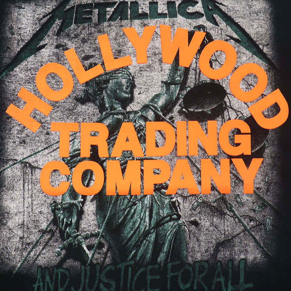 htc los angeles HTC VINTAGE METALLICA JUSTICE T-SHIRT MIX BLACK HTC VINTAGE METALLICA JUSTICE T-SHIRT MIX BLACK ONE OF A KIND VINTAGE T-SHIRT WITH ORIGINAL METALLICA PRINT, REWORKED WITH ORANGE HTC LOGO ON THE FRONT. BOXY FIT. T-SHIRTS Hollywood Trading C