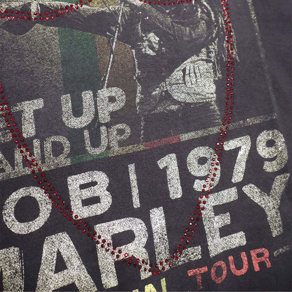 htc los angeles HTC VINTAGE BOB MARLEY 79 LUX T-SHIRT MIX BLACK HTC VINTAGE BOB MARLEY 79 LUX T-SHIRT MIX BLACK ONE OF A KIND VINTAGE T-SHIRT WITH ORIGINAL BOB MARLEY PRINT, REWORKED WITH RED STUDDED HTC LOGO ON THE FRONT. REGULAR FIT. T-SHIRTS Hollywood