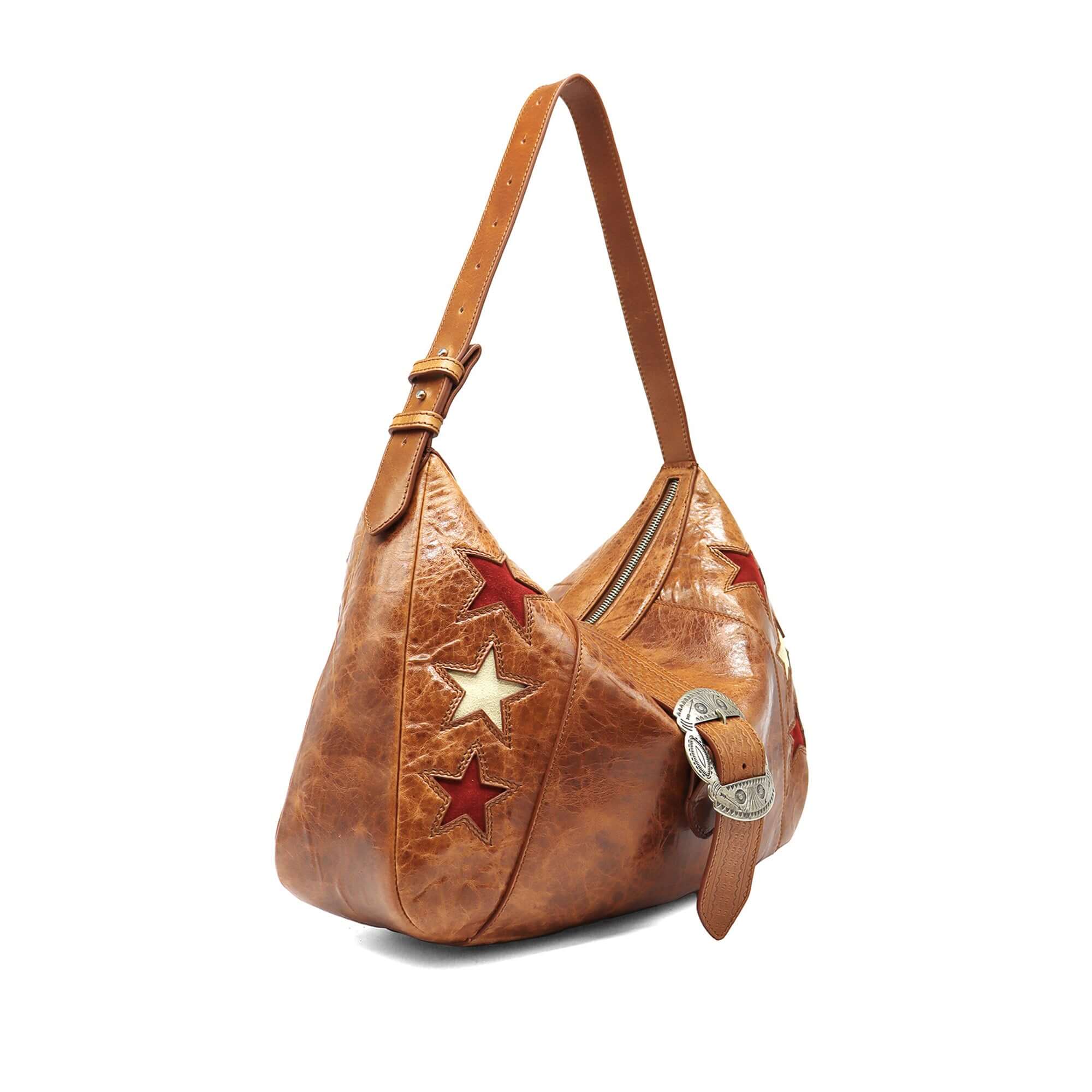 htc los angeles DEBBY STARS COGNAC Hobo bag in Cognac, featuring a zip closure along with a magnetic and buckle closure. Crafted in Italy, with star-shaped details, 100% cow leather. Hollywood Trading Company