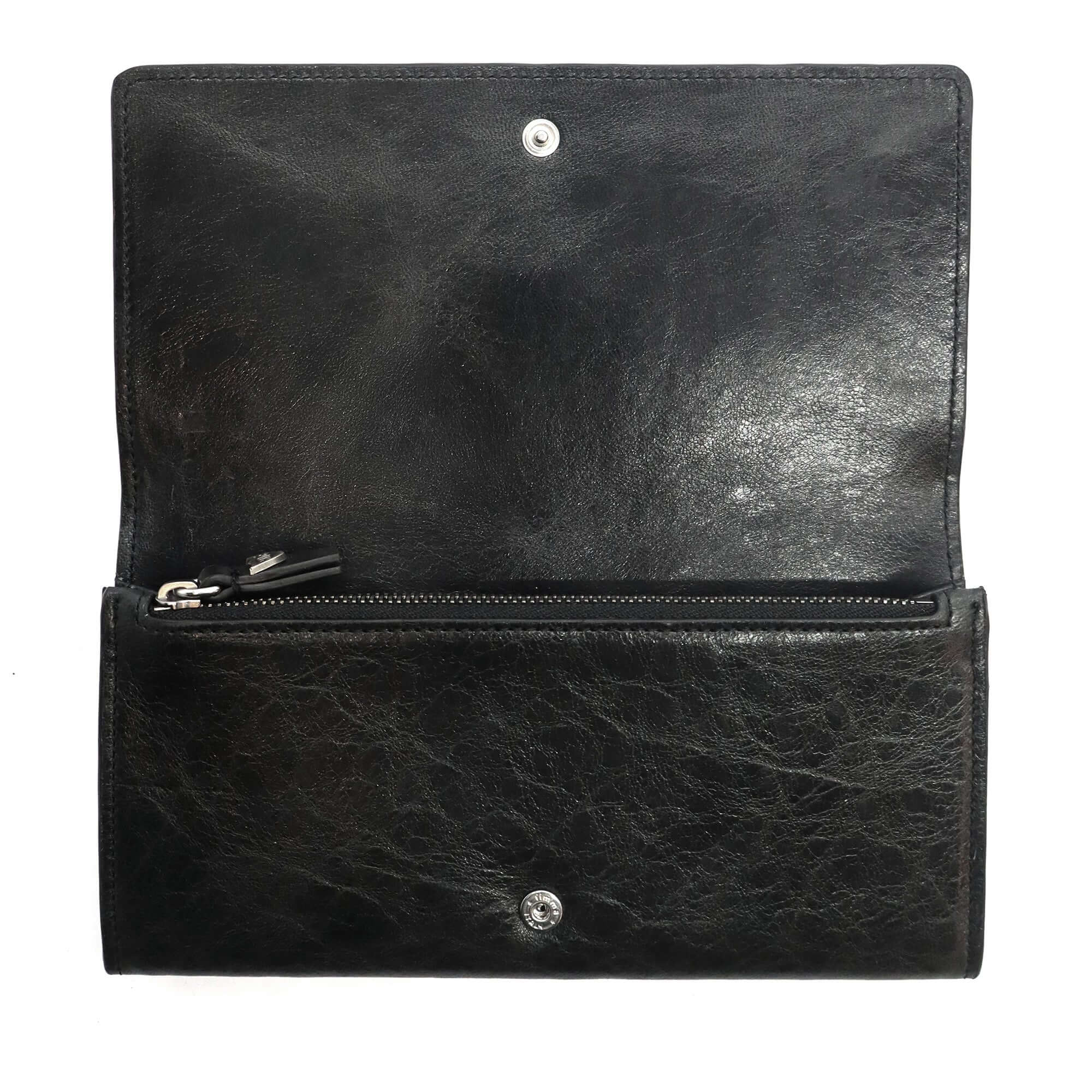 htc los angeles NANCY LONG WALLET BLACK Long wallet in Black, featuring a button closure. Designed with compartments for cards and coins, with flower studded details on the exterior. Crafted in Italy, 100% cow leather. Hollywood Trading Company