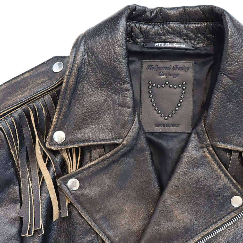 Hollywood Trading Company MICK JACKET MICK JACKET Black leather jacket. Asymmetric zip closure. removable fringes on the shoulders. Side pocket with zip closure. Zippers on the sleeves. 100% leather. Lining 100% viscose. Made in Italy. Hollywood Trading C