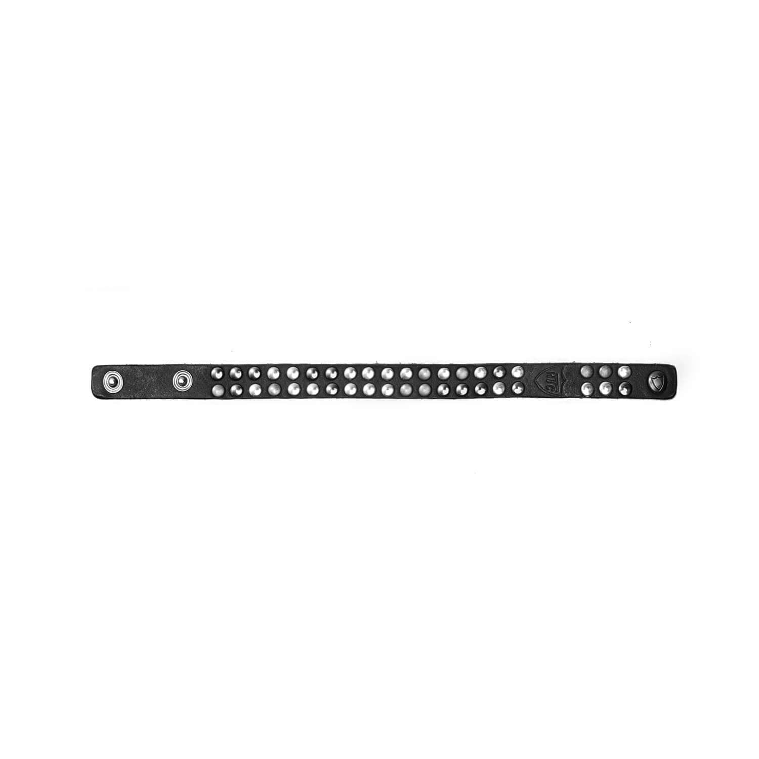 Hollywood Trading Company 10.000 MINI BR 10.000 MINI BR Black leather bracelet with double line studs, zamac button closure with carved HTC Los Angeles logo. 100% Made in Italy. Hollywood Trading Company Hollywood Trading Company
