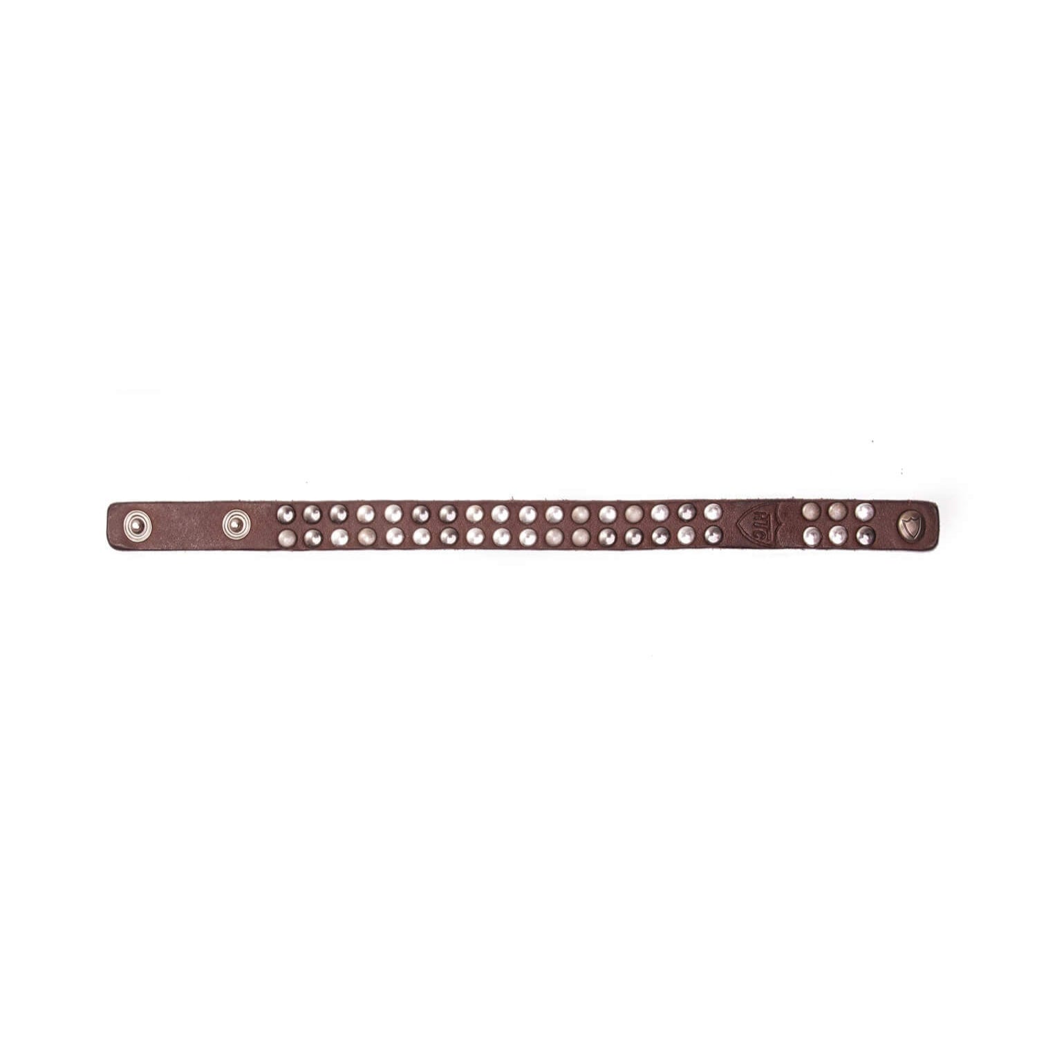 Hollywood Trading Company 10.000 MINI BR 10.000 MINI BR Brown leather bracelet with double line studs, zamac button closure with carved HTC Los Angeles logo. 100% Made in Italy. Hollywood Trading Company Hollywood Trading Company