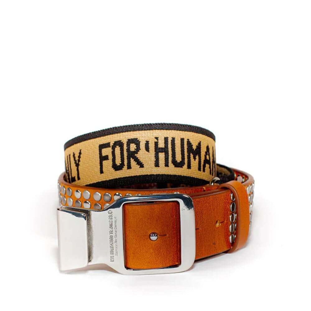 Hollywood Trading Company 5.000 FASTEN BELT 5.000 FASTEN BELT Studded leather belt & elastic band. Tension buckle closure. Height: 3,5 cm. Composition: 50% Leather 50% Polyester. Made in Italy BELTS Hollywood Trading Company Hollywood Trading Company