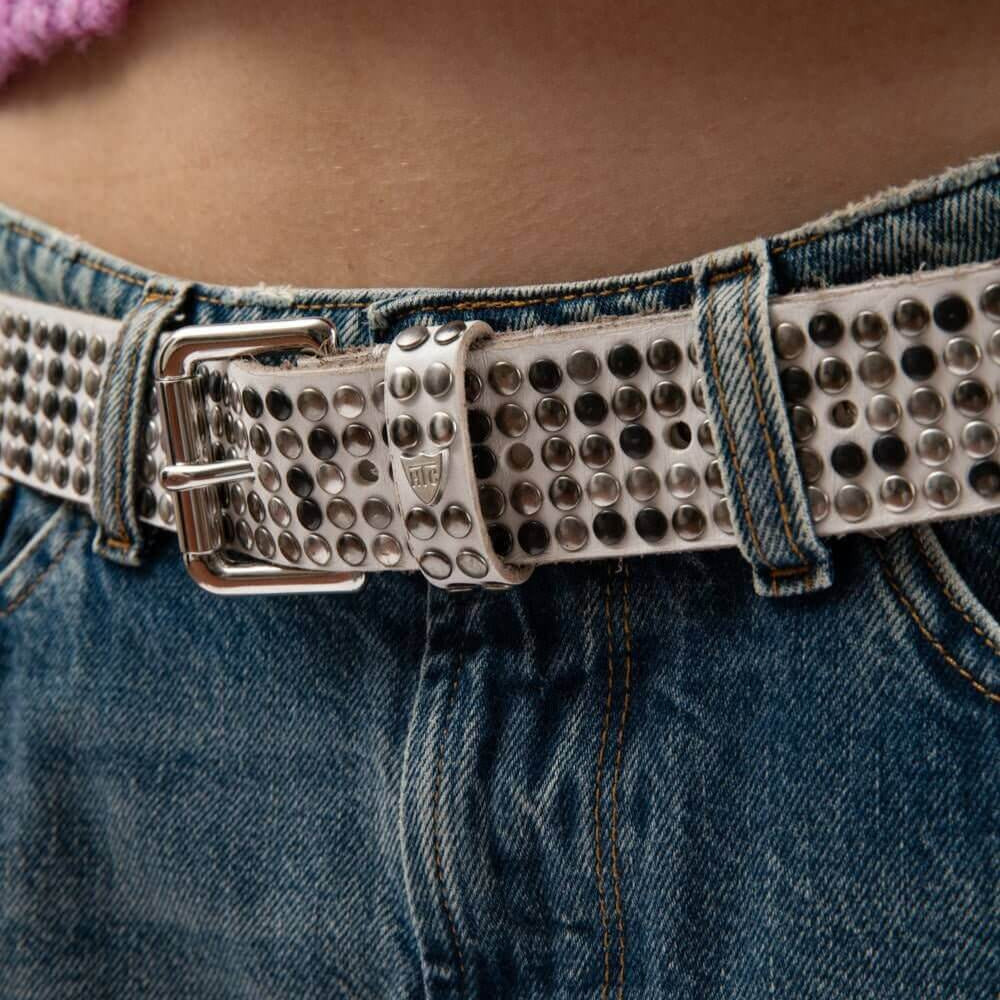 Hollywood Trading Company 5.000 STUDS BELT 5.000 STUDS BELT White Leather belt with mixed studs, brass buckle, studded zamac belt loop with HTC logo rivet. Height: 3.5 cm. Made in Italy. BELTS Hollywood Trading Company Hollywood Trading Company