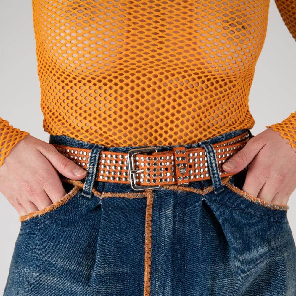 Hollywood Trading Company 5.000 STUDS COLOR BELT 5.000 STUDS COLOR BELT Leather belt with mixed studs, brass buckle, studded zamac belt loop with HTC logo rivet. Height: 3.5 cm. Made in Italy. BELTS Hollywood Trading Company Hollywood Trading Company