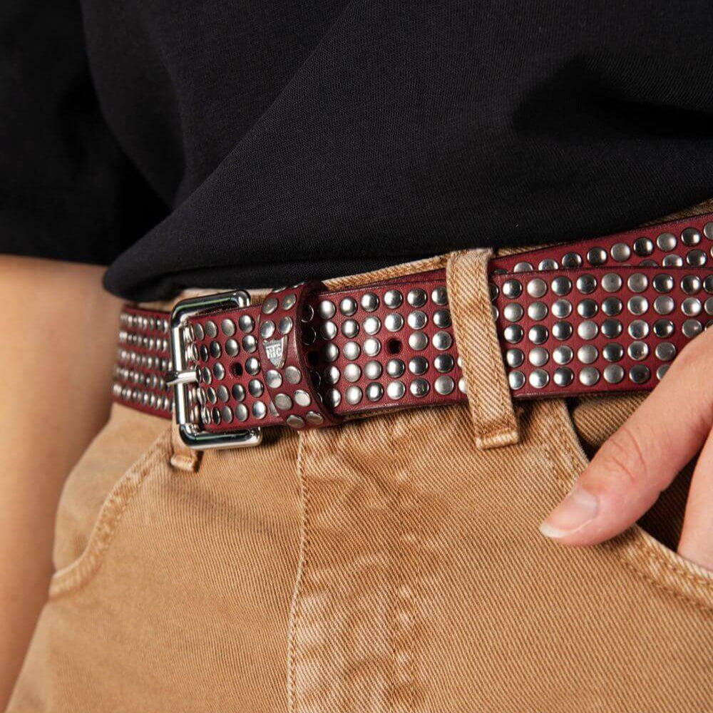 htclosangeles 5.000 STUDS COLOR BELT 5.000 STUDS COLOR BELT Leather belt with mixed studs, brass buckle, studded loop and rivet with engraved logo. Made in Italy, 3.5 cm height. Hollywood Trading Company Hollywood Trading Company