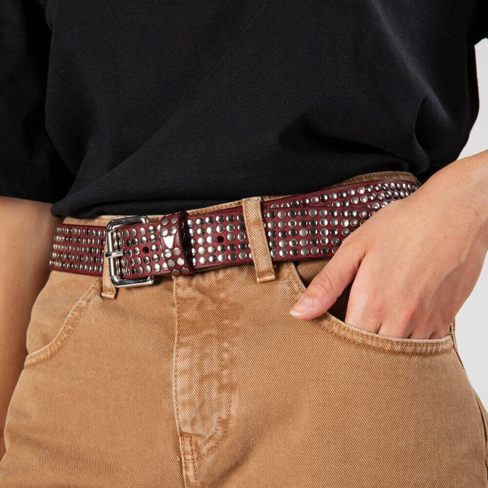 htclosangeles 5.000 STUDS COLOR BELT 5.000 STUDS COLOR BELT Leather belt with mixed studs, brass buckle, studded loop and rivet with engraved logo. Made in Italy, 3.5 cm height. Hollywood Trading Company Hollywood Trading Company