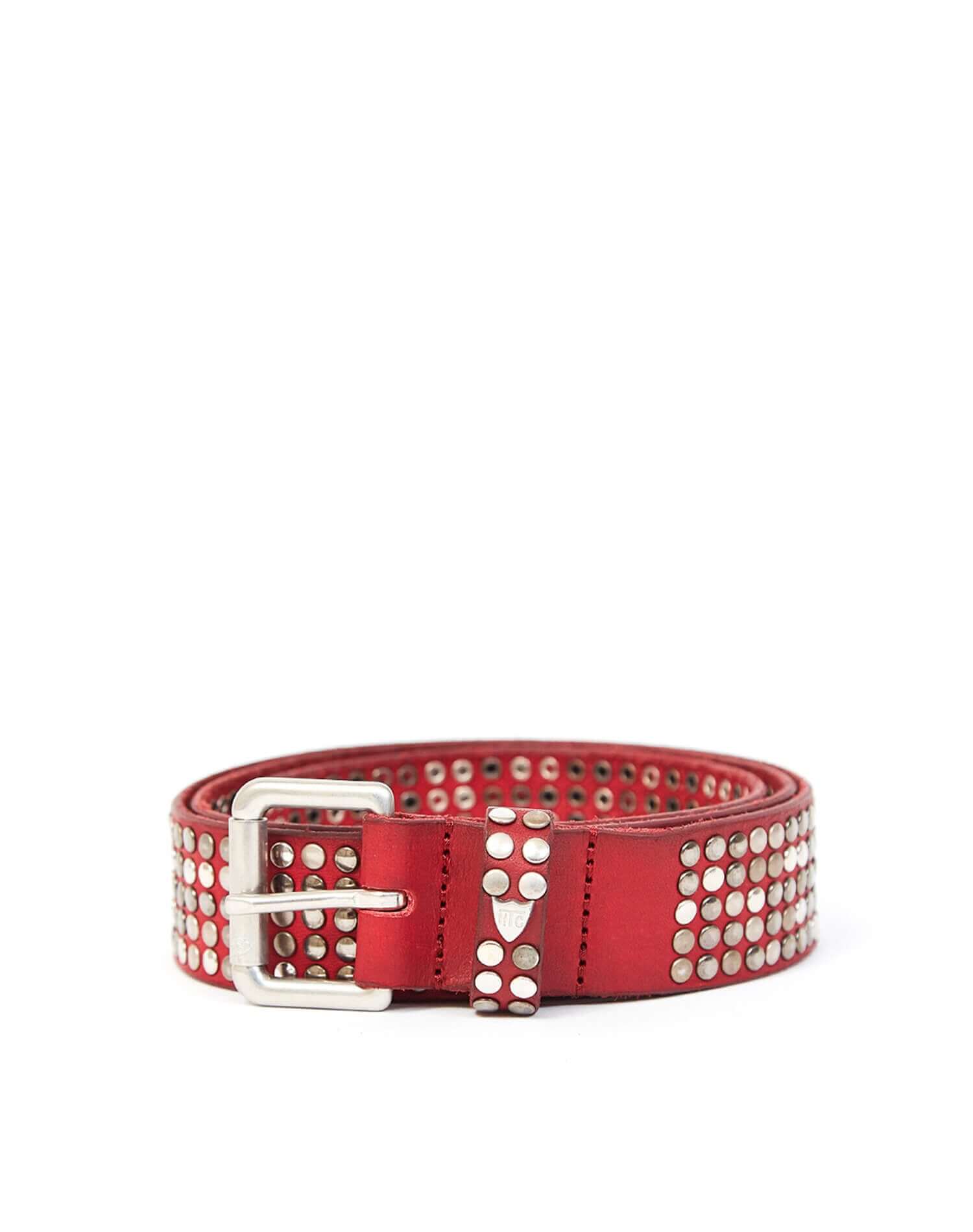 5.000 STUDS BELT Red leather belt with mixed studs, brass buckle, studded zamac belt loop with HTC logo rivet. Height: 3.5 cm. Made in Italy. HTC LOS ANGELES