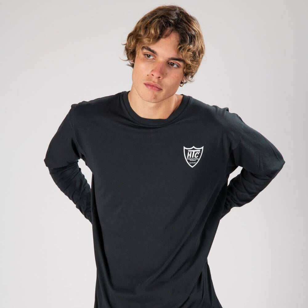 htc los angeles BANDANA LS T-SHIRT BLACK/BLACK BANDANA LS T-SHIRT BLACK/BLACK Regular fit long sleeve t-shirt with printed logo on the front. Vintage bandana set on the back. T-SHIRTS Hollywood Trading Company Hollywood Trading Company