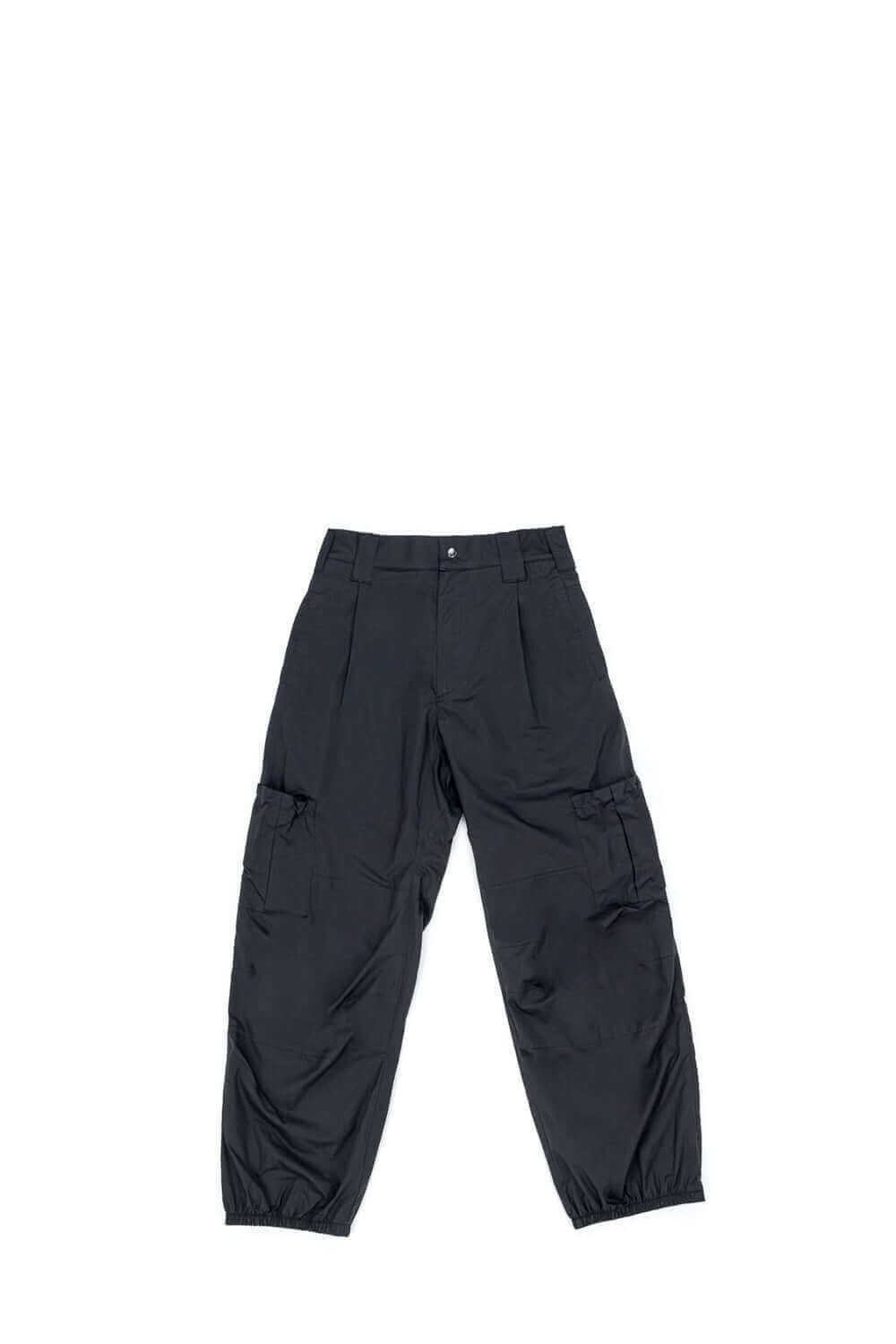 CARGO OVER W. Cargo pants with front button and zip closure. Frontal pockets. Side leg pockets and adjustable bottom closure. Composition: 100% Cotton HTC LOS ANGELES
