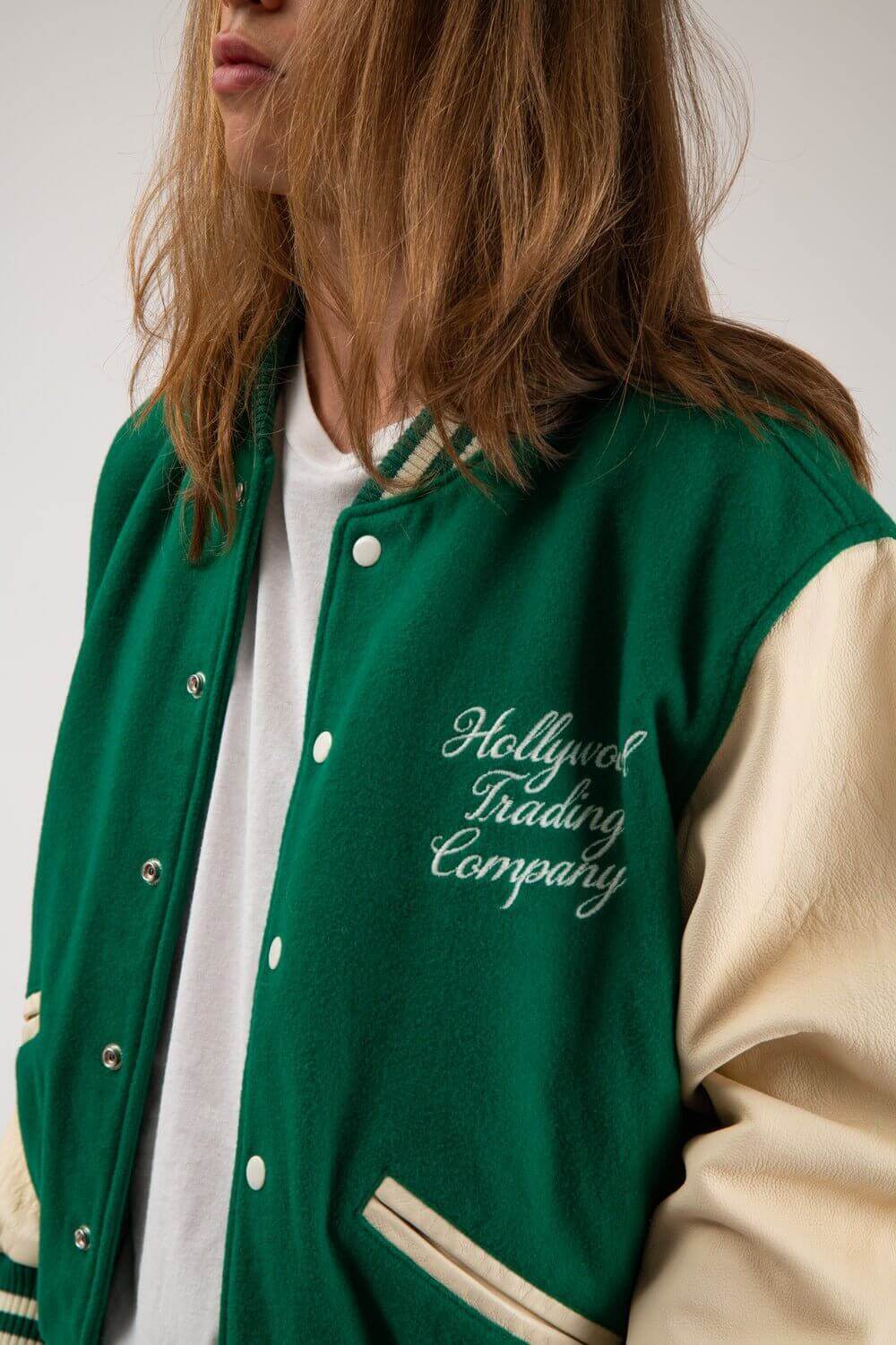 COLLEGE - EMBROIDERY MAN Varsity wool & leather bomber jacket. Front button closure, ribbed collar, cuffs and hem. Embroidered details. Two side pockets. Main body composition: 70% Wool, 30% Acrylic; sleeves: 100% Leather HTC LOS ANGELES