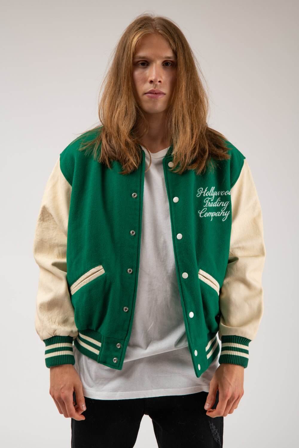COLLEGE - EMBROIDERY MAN Varsity wool & leather bomber jacket. Front button closure, ribbed collar, cuffs and hem. Embroidered details. Two side pockets. Main body composition: 70% Wool, 30% Acrylic; sleeves: 100% Leather HTC LOS ANGELES