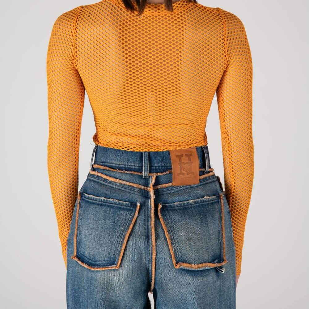 htc los angeles DUSYA 03 BLUE DUSYA 03 BLUE High waist full lenght jeans with front button and zip closure. Back leather logo patch. Stonewashed coloring may vary. Five pockets. Composition: 100% Cotton PANTS Hollywood Trading Company Hollywood Trading Co