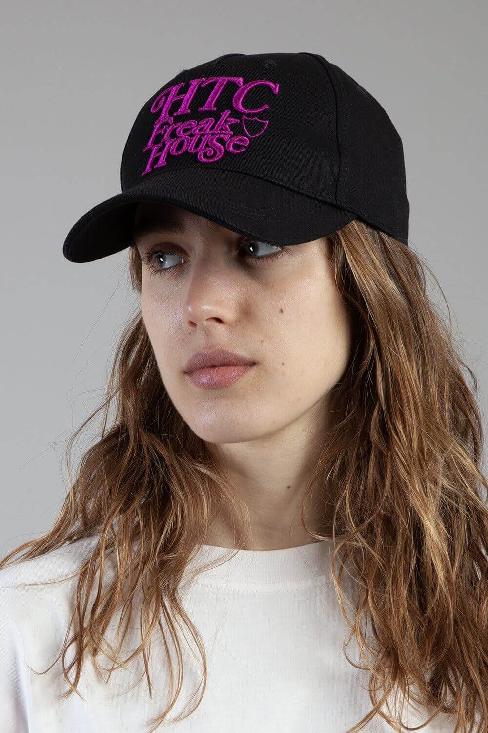 FREAK HOUSE CAP Black baseball cap , round crown with eyelets, Freak House logo embroidered on the front, adjustable strap on the back. One size fits all. 100% cotton. HTC LOS ANGELES