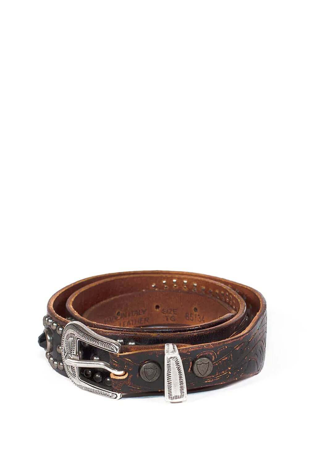 GLENDALE BELT Brown leather belt with studs and rhinestones. Carved buckle. Height: 3 cm. Made in Italy. HTC LOS ANGELES