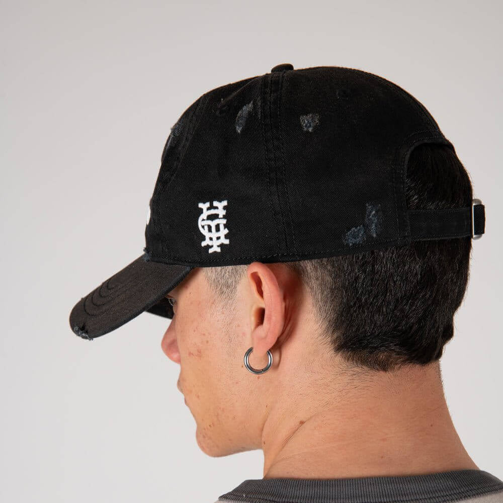 Hollywood Trading Company HOLLYWOOD T.C. BLK CAP HOLLYWOOD T.C. BLK CAP Baseball cap with preformed peak, round crown with eyelets, Hollywood TC embroidered on the front, adjustable strap on the back. One size fits all. 100% cotton. Hollywood Trading Comp