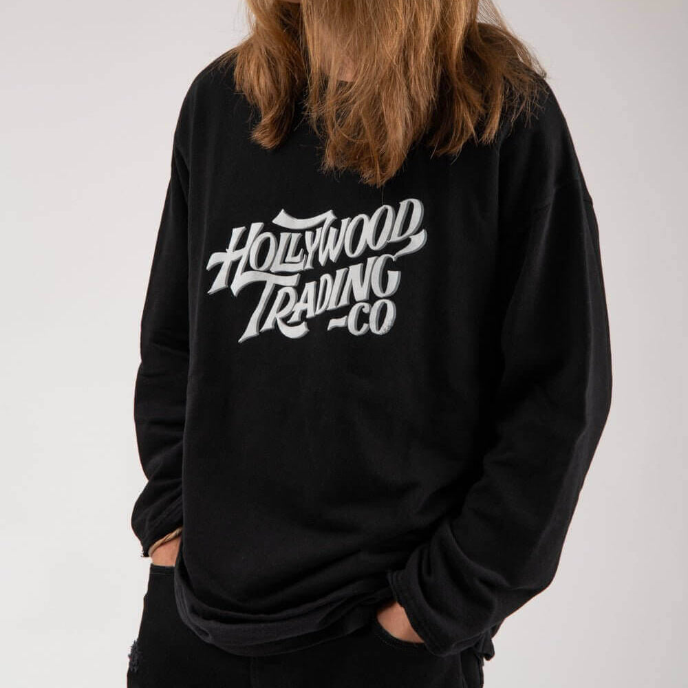 HTC LOS ANGELES HOLLYWOOD T.C. HOODIE HOLLYWOOD T.C. HOODIE Regular fit hoodie. Hood with drawstring, ribbed cuffs and hem. One front kangaroo pocket. Composition: 100% Cotton SWEATERS Hollywood Trading Company Hollywood Trading Company